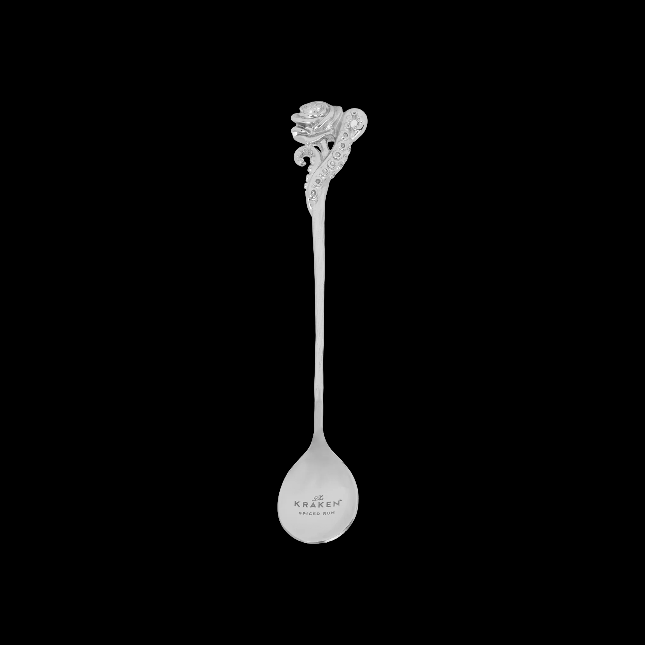 Cocktail spoon with rose design on a black background