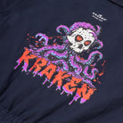 A close up view image of the Beware The Kraken Coveralls with a large spooky graphic of the Kraken printed on the back