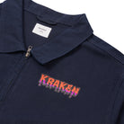 A close up view image of the Beware The Kraken Coveralls with a spooky Kraken patch on the left chest