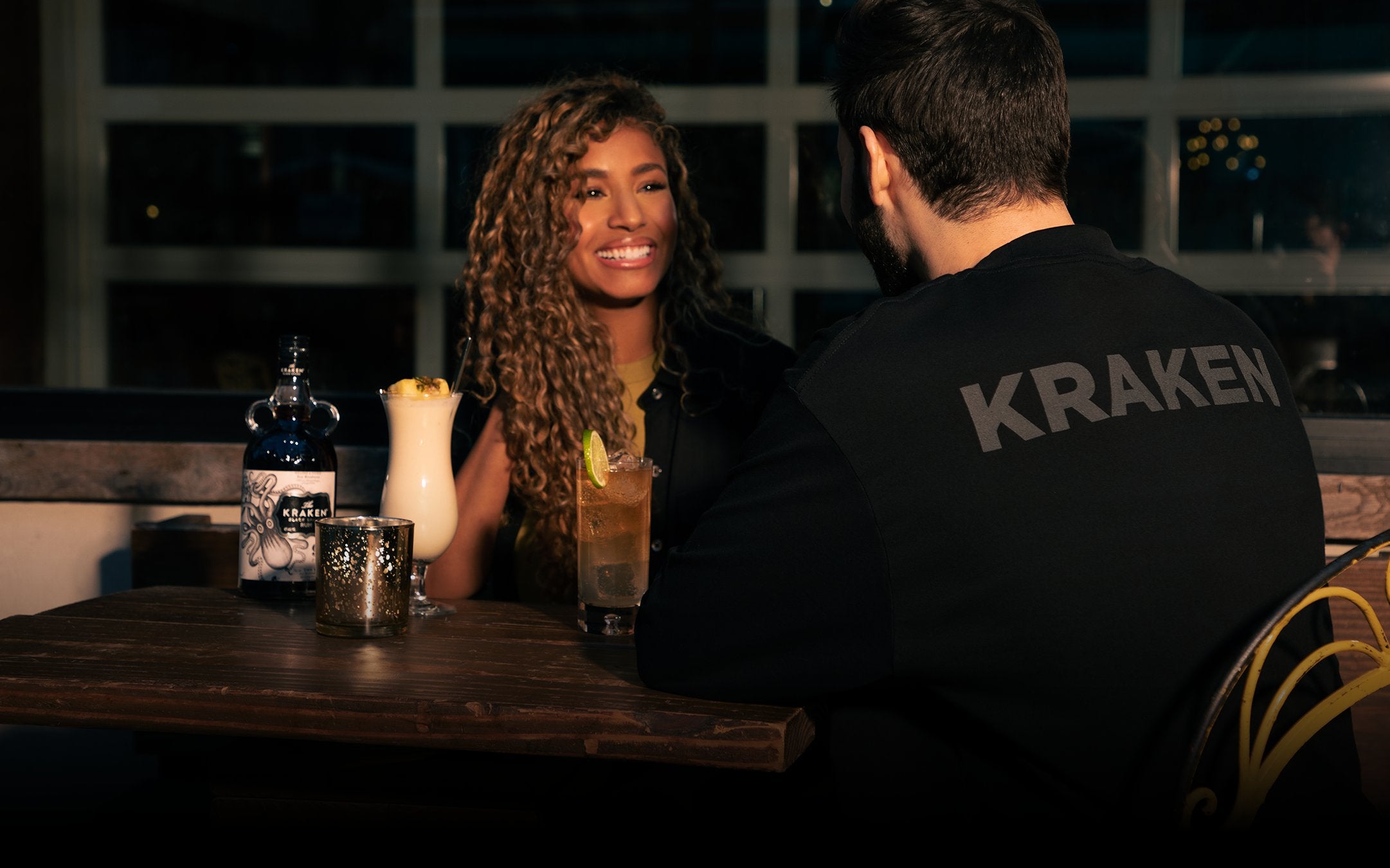 Silhouetted man wearing a Kraken hoodie