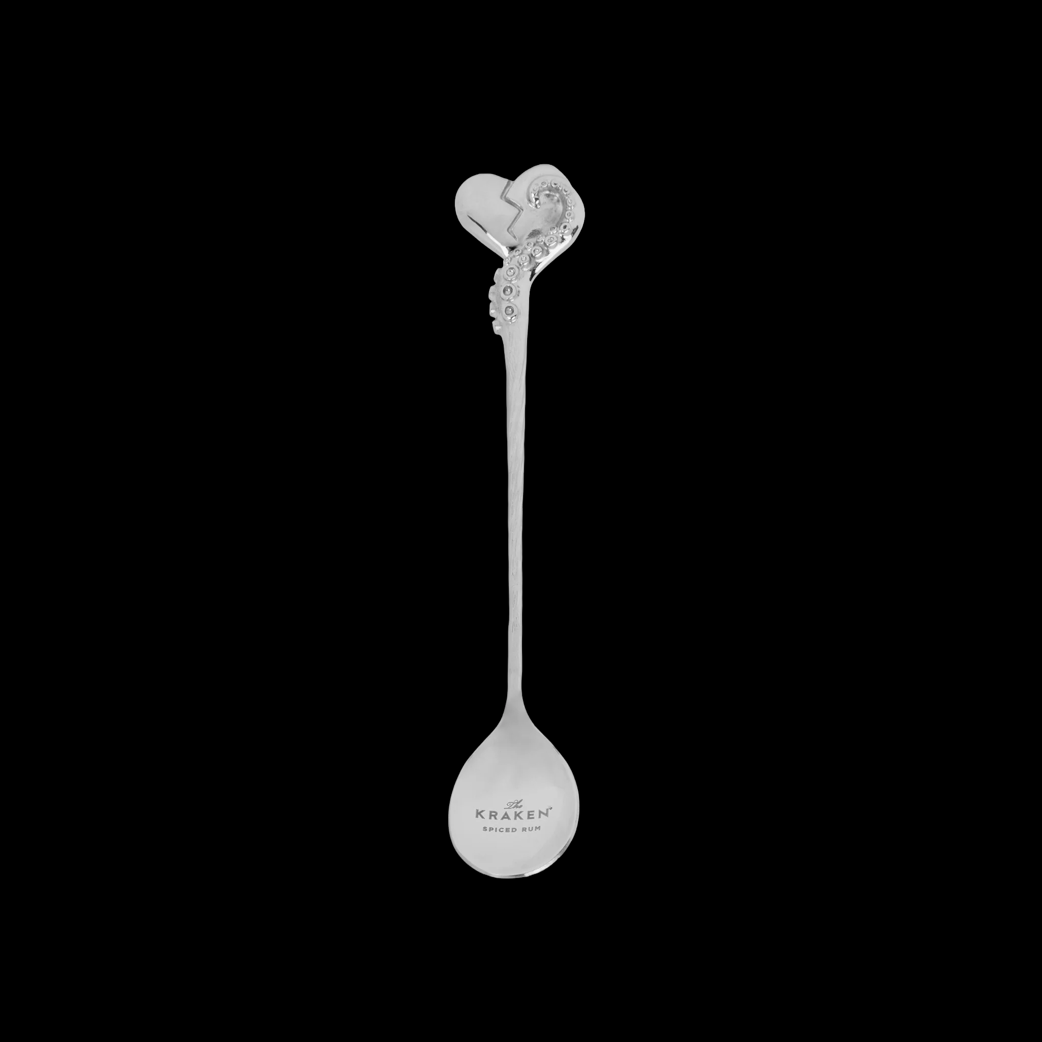 Cocktail spoon with a heart and rose design on a black background