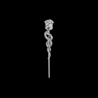 Silver rose-shaped cocktail pick on a black background