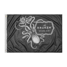 A black flag with a white image of a kraken, a mythical sea monster, wrapped around a ship. The text "The Kraken Spiced Rum" is written in a banner below the image.