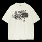 White t-shirt with black graphic and text 'I Survived the Kraken' on a black background
