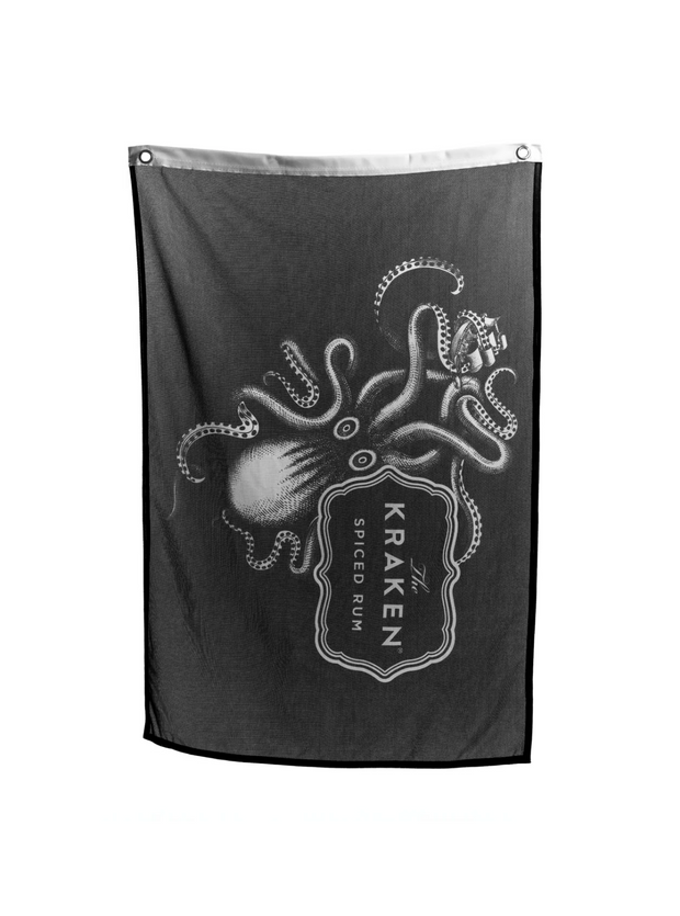 An unfurlled black flag with the Kraken logo and illustration on it's face.