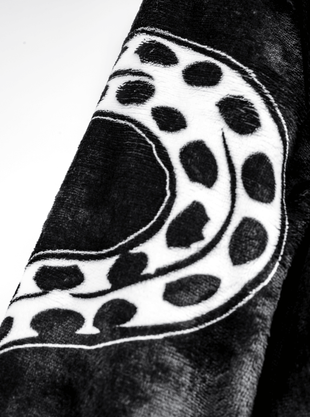 A detailed view of the Kraken-uggies's black plus fabric, showcasing the tentacle illustration detail