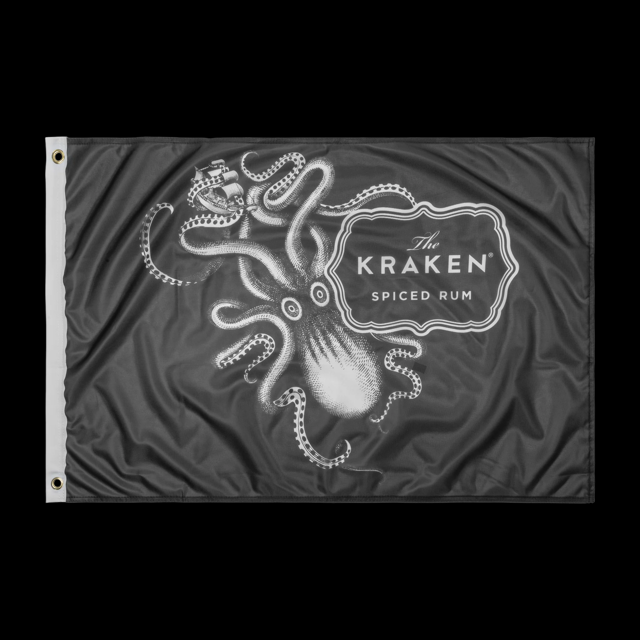 A black flag with a white image of a kraken, a mythical sea monster, wrapped around a ship. The text "The Kraken Spiced Rum" is written in a banner below the image.