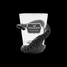 Clear shot glass with 'The Kraken Spiced Rum' label and black tentacle design