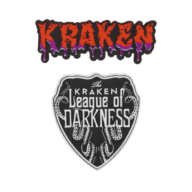 Image of Kraken Rum patches bundle. One in the red and purple drip design of the work "KRAKEN" and one in black and white of the League of Darkness badge.
