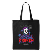 Black tote bag featuring a white skull with red eyes surrounded by purple and teal kraken tentacles, with dripping red text that reads 'KRAKEN'.